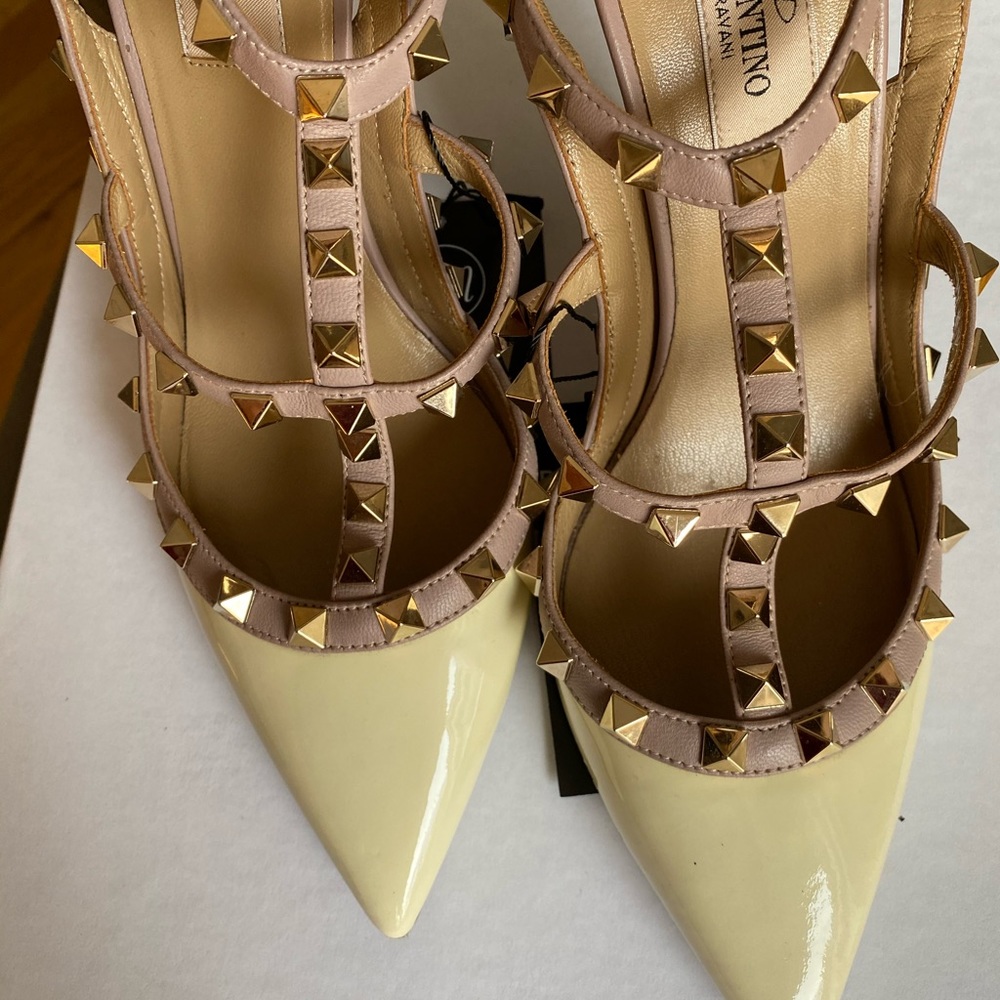 Valentino Garavani Rockstud Pointed Toe T-Strap Pumps in Ivory and Nude - Picture 3 of 9